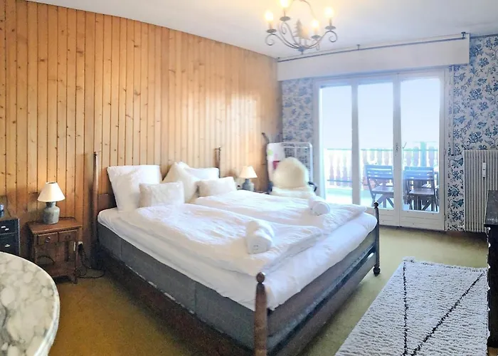 Between Slopes And Golf Facing The Alps